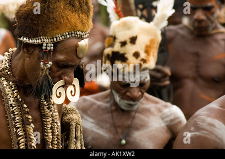 Asmat tribal men in killing evil soul ceremony, Omandeseb, Irian Jaya Indonesia. Stock Photo