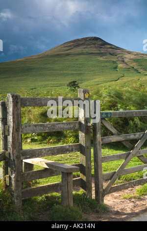 Five barred gate and style on footpath to summit of Sugar Loaf Mountain Black Mountains Brecon Beacons National Park Stock Photo