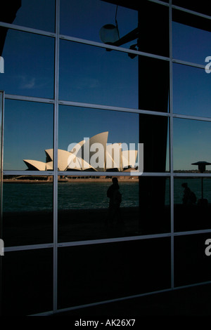 The Sydney Opera House on a beautiful day in reflection of the Sydney Passenger terminal Stock Photo