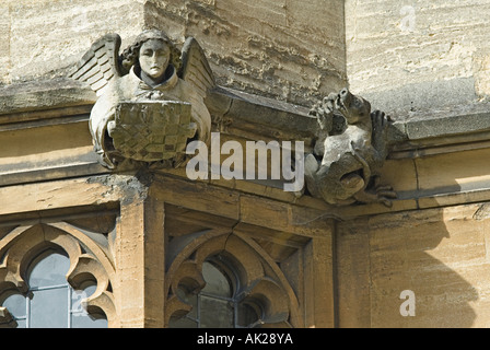 Ornate stone carvings adorning the walls of Magdalen College University of Oxford Oxford England Stock Photo