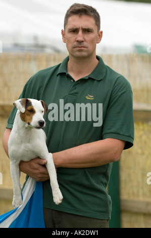 Dog handler and jack russel terrier at Game Conservancy Scottish Fair 2006 Stock Photo