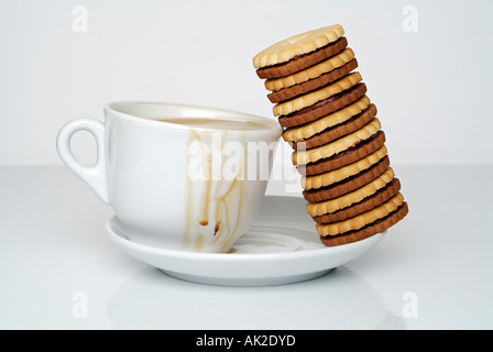 Cup of Coffee with a Stack of Chocolate Biscuits Stock Photo