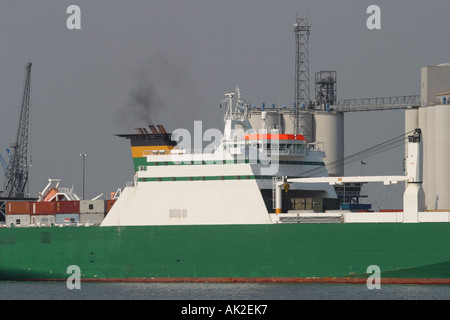 Large commercial container ship vessel leaves Southhampton docks Stock Photo