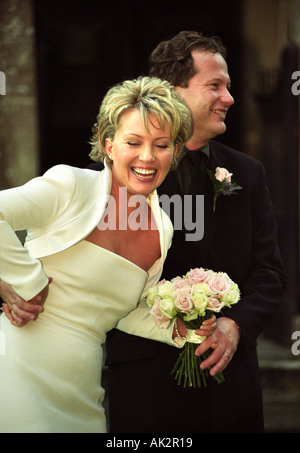 NEWSREADER KIRSTY YOUNG WITH HER HUSBAND NICK JONES OUTSIDE THE CHAPEL ...