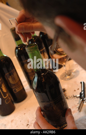 french vintage chateau palmer wine recorking process macau Stock Photo