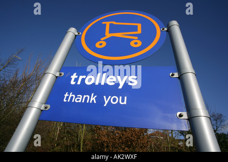 Sign at trolley station in supermarket car park Colchester Essex England United Kingdom Stock Photo
