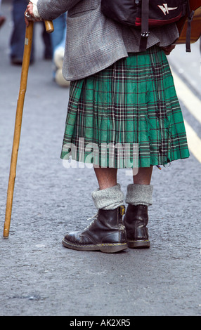 Man wearing kilt and black boots at the Edinburgh Festival, Royal Mile, Edinburgh, Scotland Stock Photo