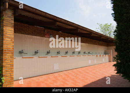 Outdoor washing facilities at a trailer park Stock Photo