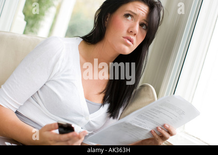 woman checking accounts Stock Photo