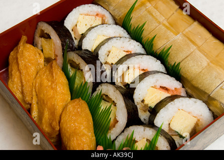 View of Japanese New Year foods displayed in a jubako, a three-tiered ...