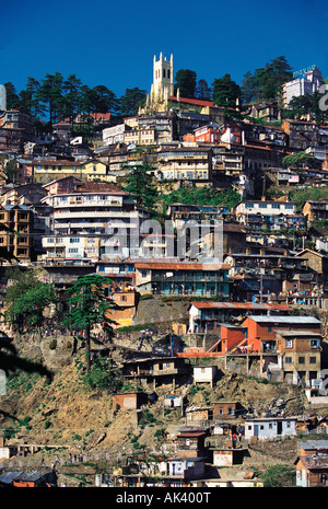 India. Himachal Pradesh. Shimla. Town buildings with Christ church on top of hill. Stock Photo