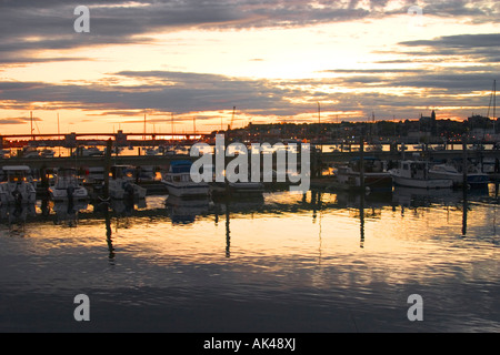 Portland Maine The sun sets over the harbor in a blaze of glory Stock Photo