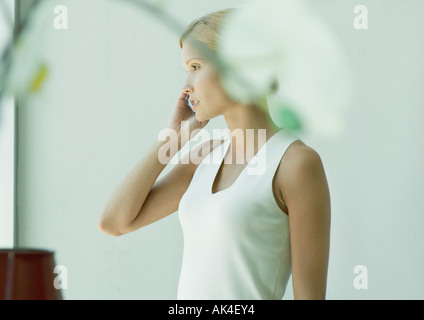 Woman using cell phone Stock Photo