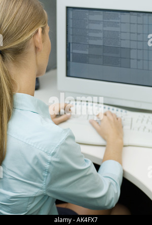 Woman using computer Stock Photo