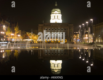 A still night in the Market Square at Nottingham, with the Council House reflected like a mirror in the fountains, Nottingham UK Stock Photo