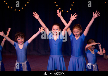 Young ballerinas appear in a dance shool production uk Stock Photo