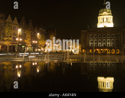 A still night in the Market Square at Nottingham, with the Council House reflected like a mirror in the fountains, Nottingham UK Stock Photo