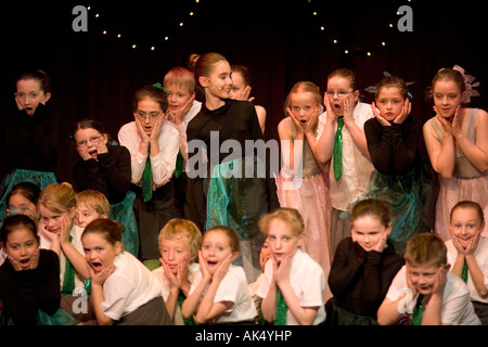 Young singers appear in a dance shool production uk Stock Photo