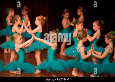 Young ballerinas appear in a dance shool production uk Stock Photo