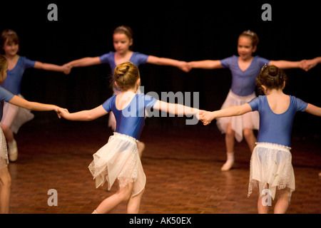 Young ballerinas appear in a dance shool production uk Stock Photo