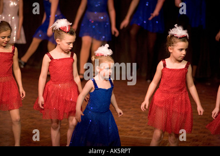 Young ballerinas appear in a dance shool production uk Stock Photo