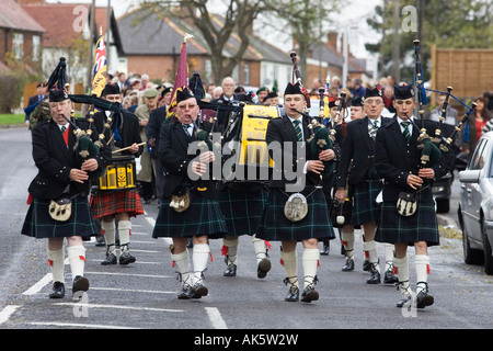 War veterans play their pipes as they march at Remembrance Sunday Service Stock Photo
