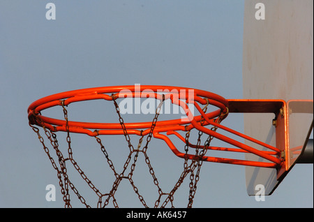 Detail of a baskeball hoop and chain net in a park  Stock Photo