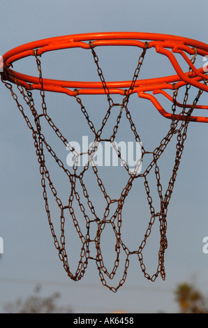 Detail of a baskeball hoop and chain net in a park  Stock Photo