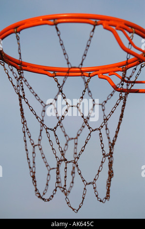 Detail of a baskeball hoop and chain net in a park  Stock Photo