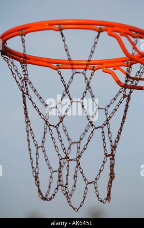 Detail of a baskeball hoop and chain net in a park  Stock Photo