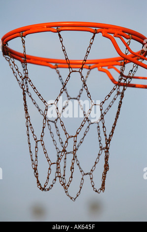 Detail of a baskeball hoop and chain net in a park  Stock Photo