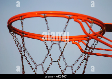 Detail of a baskeball hoop and chain net in a park  Stock Photo