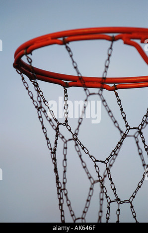 Detail of a baskeball hoop and chain net in a park  Stock Photo