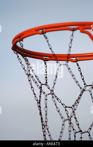 Detail of a baskeball hoop and chain net in a park  Stock Photo