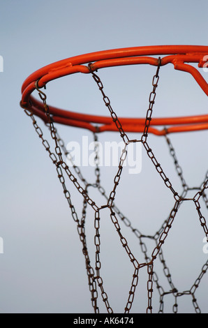 Detail of a baskeball hoop and chain net in a park  Stock Photo