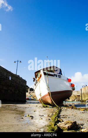 Fishing Boat in Newquay Harbour at Low Tide Stock Photo