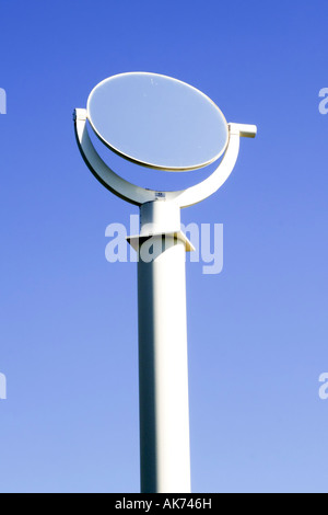 Rotating mirror to capture sunlight and reflect it to solar panels Stock Photo