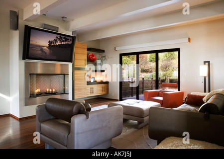 Cozy Modern Living Room with Candle Fireplace Stock Photo