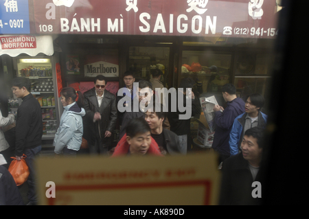 Chinatown from a window bus Manhattan New York City USA colour color Stock Photo