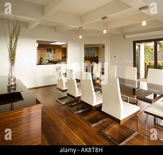 Modern White Dining Room with Hardwood Floors Stock Photo