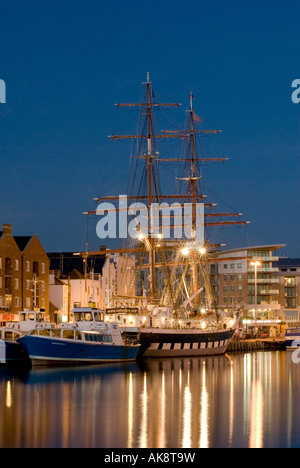 Tall ship berthed in Poole Quay, Dorset, England, UK Stock Photo