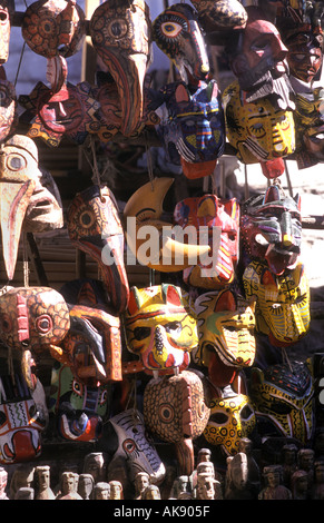 Colourful wooden masks from Nahuala for sale at Chichicastenango market GUATEMALA Stock Photo