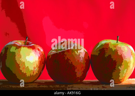 Three apples with a red background Stock Photo