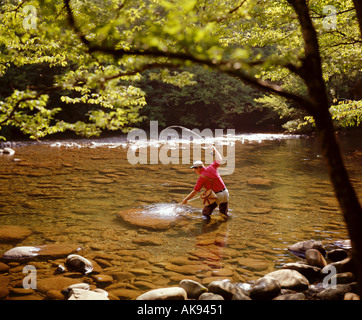 man fishing in Little Pigeon River near Gatlinburg Tennessee USA Stock Photo