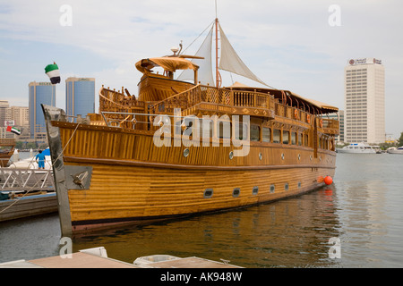 Sleek stylish hand-built wooden arabian sailing boat in Dubai Creek and Marina UAE Stock Photo