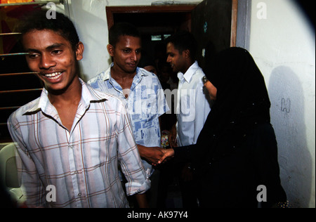 Male Saufa Ibrahim and Mohamed Misdhath are welcoming guest on their wedding party Stock Photo