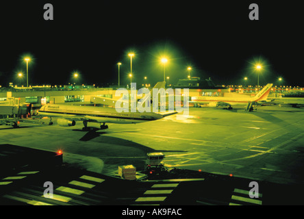 Airport at night; Manchester Airport, Greater Manchester, England, UK. Stock Photo