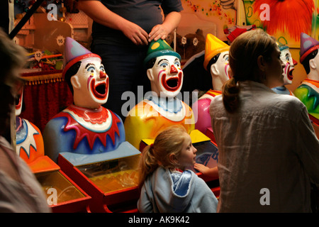 Laughing Clowns at a fair Stock Photo