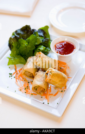 Crispy Shrimp Spring Roll mint / sweet chili Stock Photo