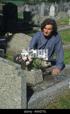 man in a graveyard Stock Photo